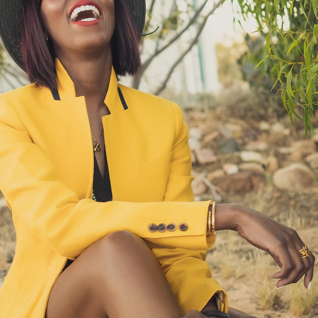 Model Wearing Dalasini Wakanda Gold Pendant Necklace