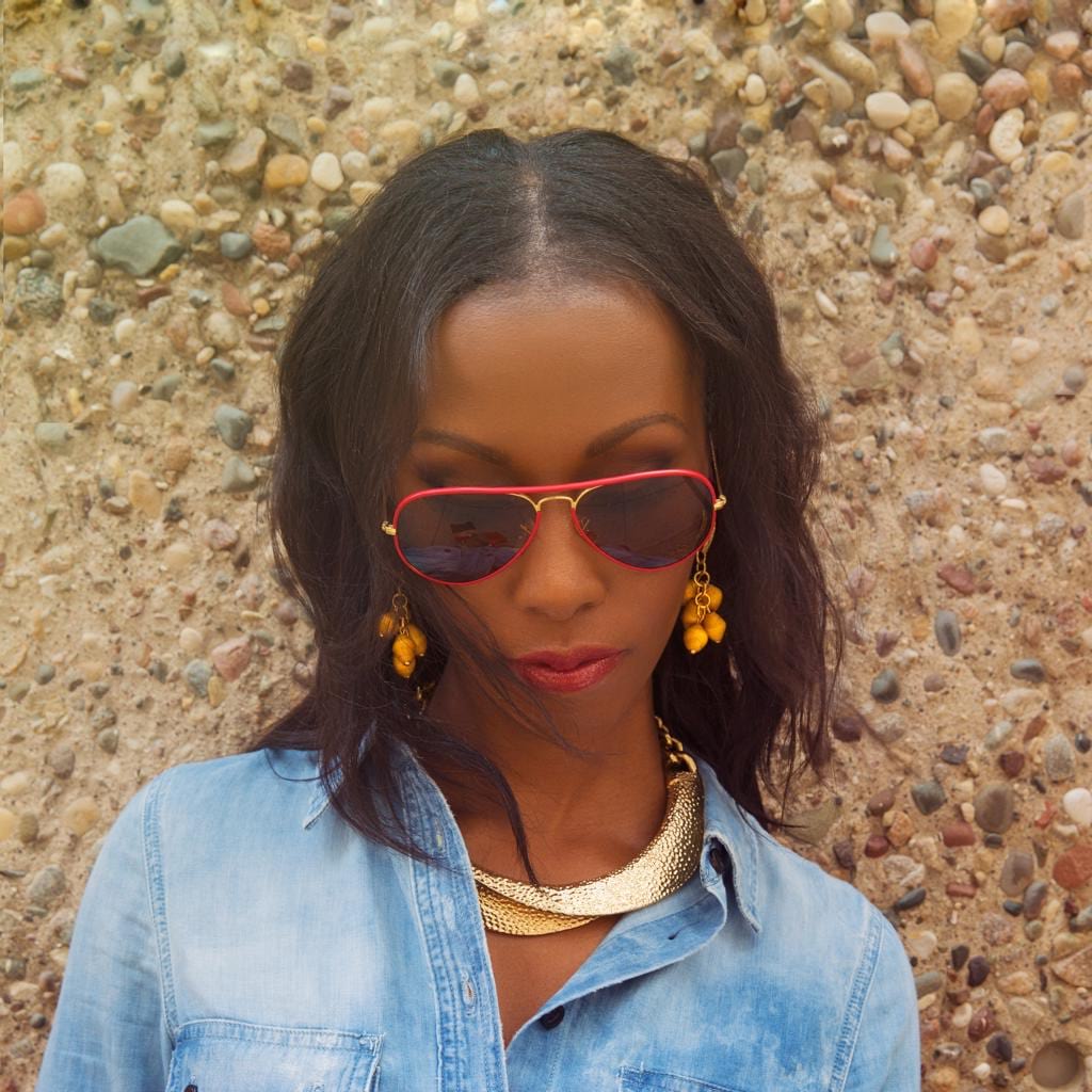 Model Wearing Dalasini Mara Hammered Gold and Paper Bead Earrings in Goldenrod