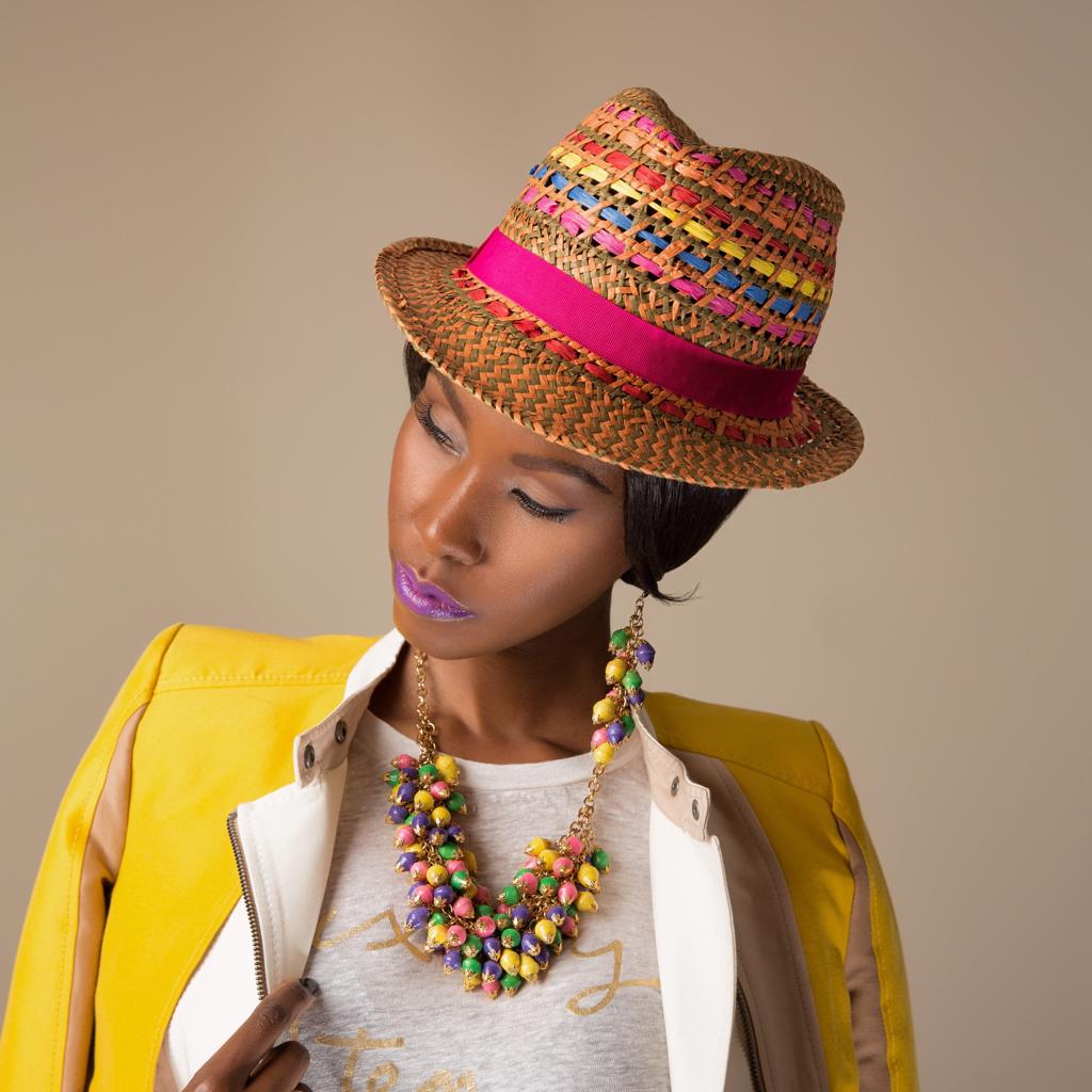 Model Wearing Dalasini Nairobi Multi Color Amethyst and Paper Bead Earrings and Necklace