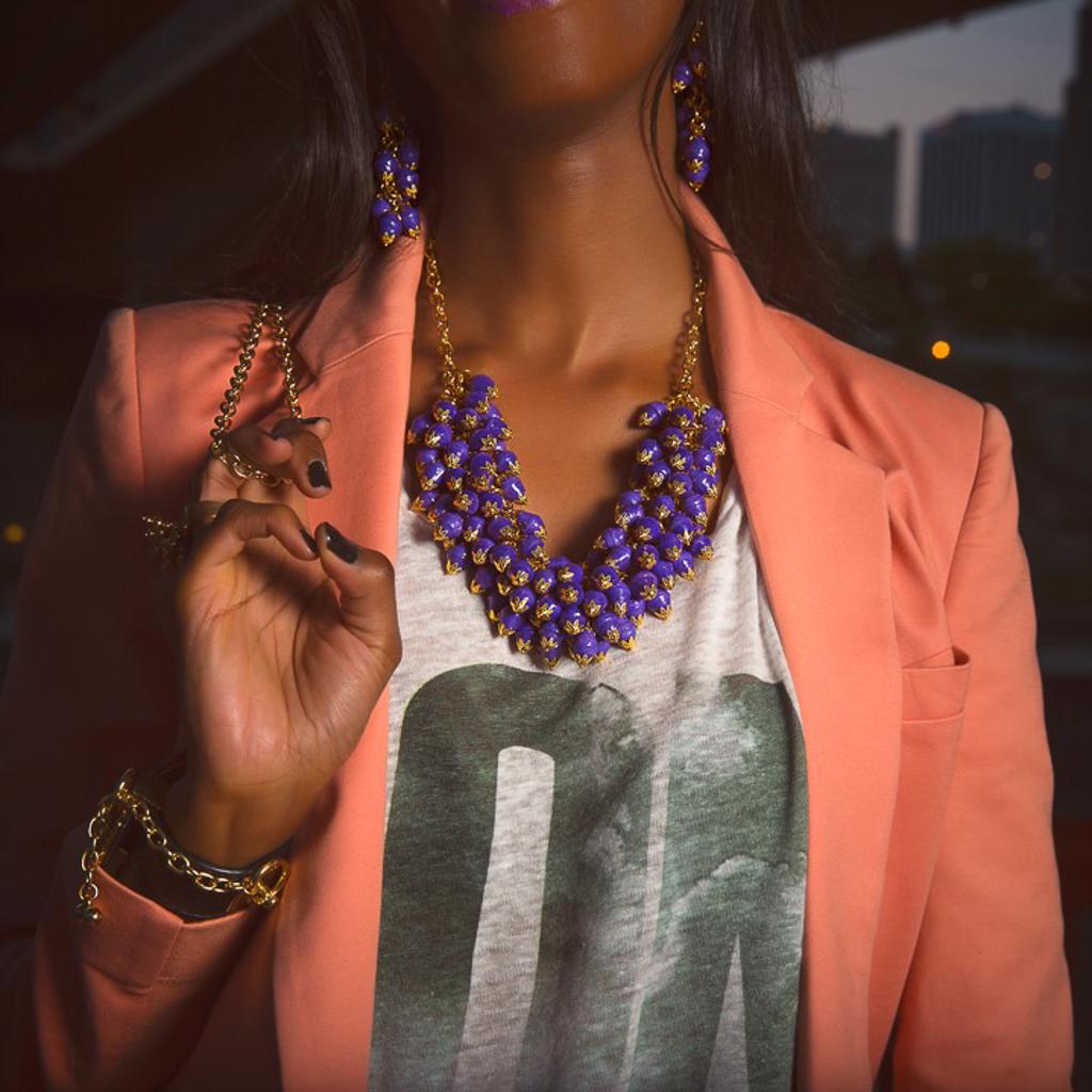 Model Wearing Dalasini Nairobi Purple Amethyst and Paper Bead Earrings and Necklace